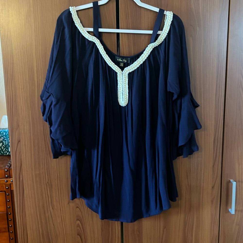 Nice. Navy blue with pearls and lace at the top